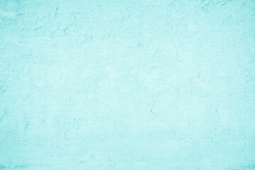 Grungy blue textured paper background with faded watercolor paint stains.