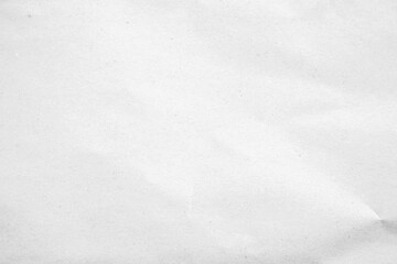 White recycled craft paper texture as background. Grey paper texture, Old vintage page or grunge vignette of old newspaper. Pattern rough art creased grunge letter. Hardboard with copy space for text.