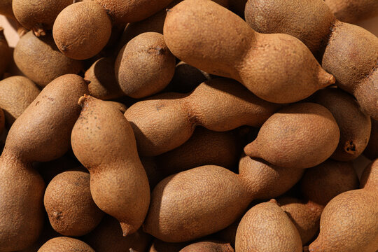 Tamarind, concept of tasty food, fresh tamarind fruit
