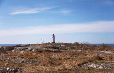Obraz premium Landsort most southern point in Stockholm archipelago lighthouse, pilots and a history as a point of defense since hundreds of years. Today bird watching and recreation.