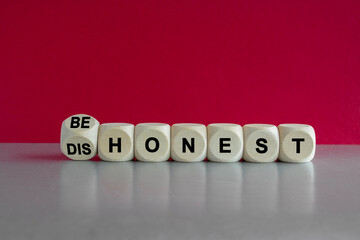 Be honest or dishonest symbol. Turned cube and changed concept words Dishonest to Be honest....