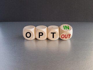 Turned a cube and changed concept words opt out to opt in. Beautiful grey table black background....