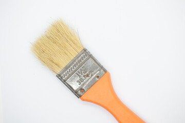 Wood handle painting brush on a white background