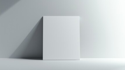 Minimalistic blank white canvas mockup standing against a smooth wall with soft lighting and subtle shadows, ideal for art, photography, or graphic design presentation.