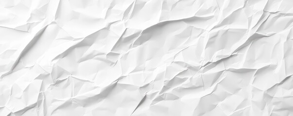 A close-up of crumpled white paper texture, showcasing a range of folds and creases that create an organic, abstract pattern.