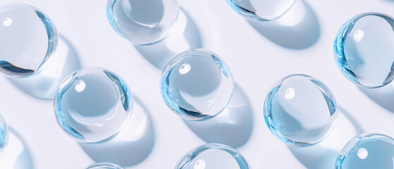 transparent gel ball sphere with top view and light blue liquid inside on white minimalist background