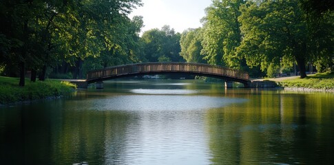 Obraz premium Charming riverside waterfront featuring a picturesque bridge, perfect for serene escapes and scenic views.