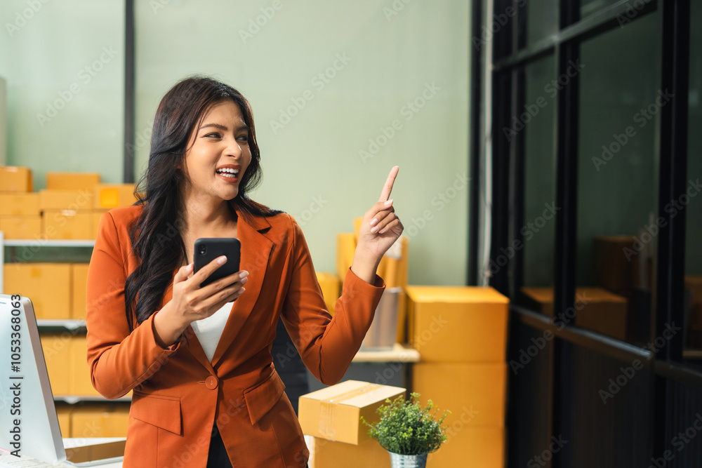 Wall mural happy young entrepreneur women presenting or pointing, happy working.