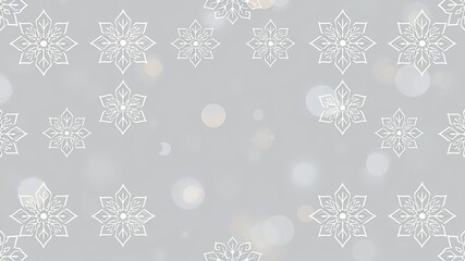 A delicate pattern of white snowflakes against a soft, blurred gray background.  The snowflakes are intricate and detailed, with a sense of delicate beauty.