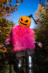 Axe in pumpkin