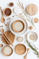 Wooden bowls with quinoa and seeds on white background.