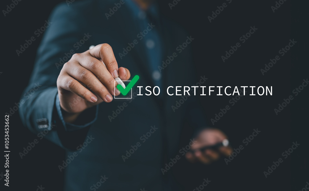 Fototapete iso certification approval concept. a person highlighting iso certification process with a glowing c