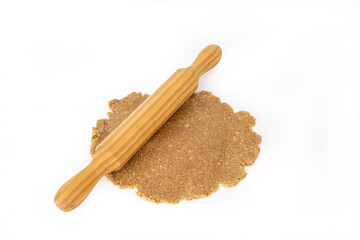 Rolled out oatmeal cookie dough with all ingredients mixed
