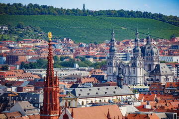 Fototapeta premium Haug Abbey buildings and vineyards in picturesque city Wurzburg