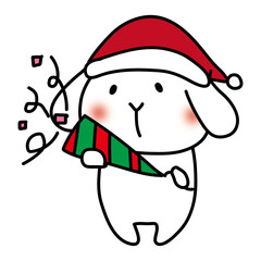クラッカーでクリスマスのお祝いをする白いうさぎ