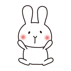 お腹を見せている白いうさぎ