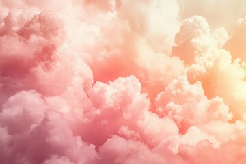 Naklejka premium Peach and pink cumulus clouds fill a softly lit sky, creating a dreamlike and ethereal atmosphere