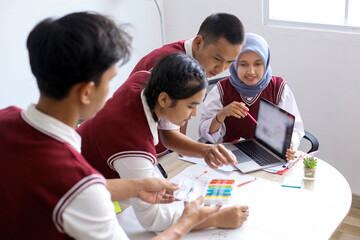 High School Students Doing School Work Together at The Study Room	