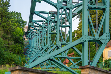 Fototapeta premium Schwebebahn Dresden one of oldest suspended railroads in world. Iron construction only. Suspension cable car, Dresden, Germany