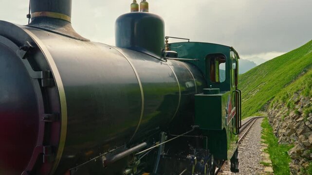 Train of cogwheel , tourist train, of Swiss alps and lake Brienz, Close up. Brienzer Rothorn