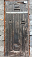 The old door has worn paint