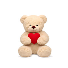 Obraz premium A teddy bear is holding a red heart isolated on white
