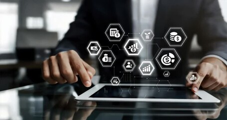 Businessman with tablet digital icons and hexagons representing business technology and innovation, financial literacy, budgeting workshops, financial coaching