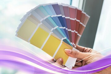 Closeup of hands holding color swatch