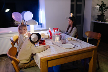 Family celebrating a birthday at home. Birthday party