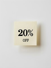 Black '20% OFF' Text on a Ivory Square Paper Note. White Background 