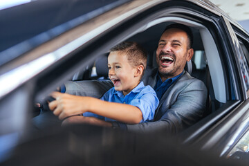Joyful Father and Son Bonding Over a Fun Car Ride