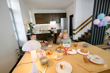 Family having a birthday party at home