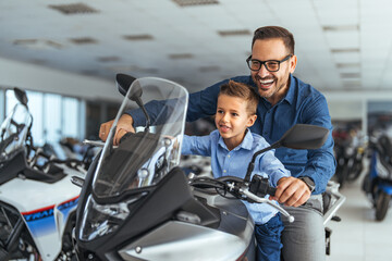Father and Son Enjoying a Fun Motorcycle Ride Together