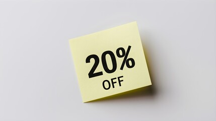 Black '20% OFF' Text on a Light Yellow Square Paper Note. White Background with Copy Space