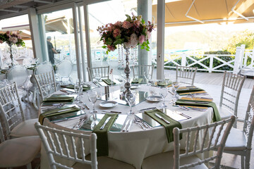 Beautifully Arranged Banquet Hall for a Special Occasion, Featuring Romantic Ambiance