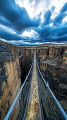 A dramatic suspension bridge spans a deep canyon under a moody sky, emphasizing adventure.