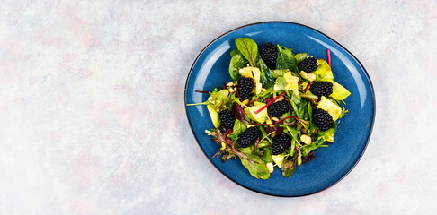 Plate of colorful fresh salad, recipe place.