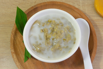 Mung Bean Porridge or Bubur Kacang Hijau, Indonesian dessert porridge of mung beans with coconut milk, pandan leaf and ginger.