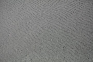 Obraz premium Closeup of beach sand texture background.