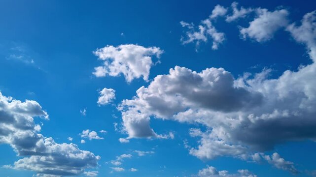 Sky timelapse. Daytime time-lapse. Skies are moving. Moving clouds and sun. The Sky with clouds. Cloud cloudscape time-lapse. Blue sky time lapse. Nature sky.