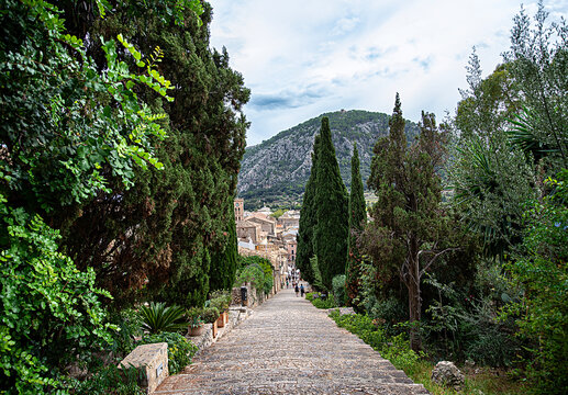 Photography of The Calvari Steps staircase, Pollensa, Mallorca, resort, town, buildings, street, palm, pine; cypress; mountain