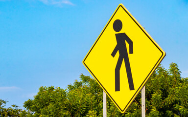 Yellow traffic sign pedestrian zone in Puerto Escondido Mexico.