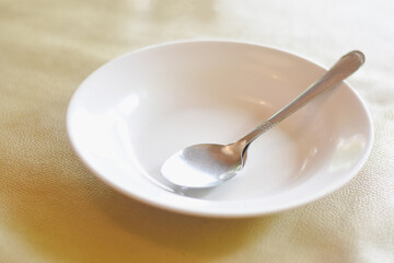 White plain rice plate and spoon