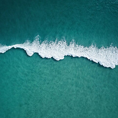 Aerial view beautiful of sea waves from drone. Stock image of blue color of ocean water, sea surface. Top view on turquoise waves, clear water surface texture.	