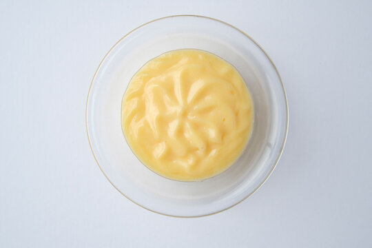Top-down shot of bowl of custard aga