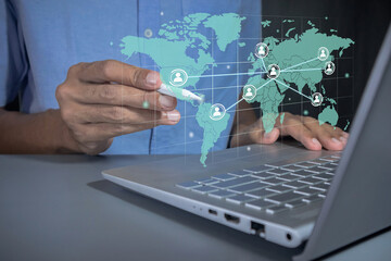 Man with global communication network on virtual screen. Global business or worldwide business concept.