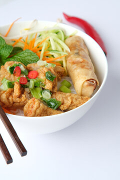 Bun Cha Gio bowl topped with fried spring roll and Cha Lua.