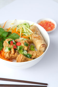 Bun Cha Gio bowl topped with fried spring roll and Cha Lua.
