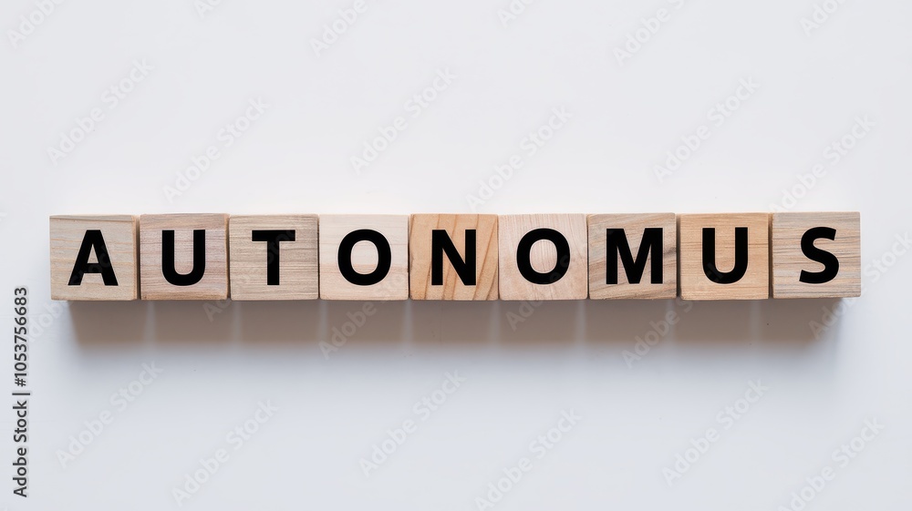 Poster autonomus text spelled out on wooden blocks representing innovative and futuristic automation techno