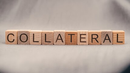 Collateral financial security and business liability concept displayed with wooden blocks spelling out the word  collateral   Representing contracts loans debt assets and other financial obligations